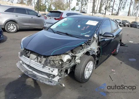 2021 Toyota Prius Le from USA, damaged, VIN JTDKAMFU9M3128068
